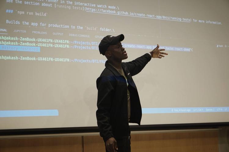 a DTI member presenting code at the Big Red Hacks hackathon event